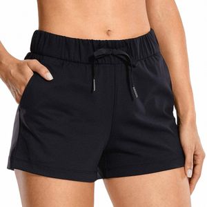 Shorts pour femme d'été Fi Sports couleur unie poche ample Shorts décontractés pantalons de Yoga 865w #