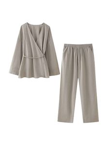 Zomer dames textureerde dubbele revers en kleding jas top 2024 nieuwe casual veter pamas brede been broek tweedelige set