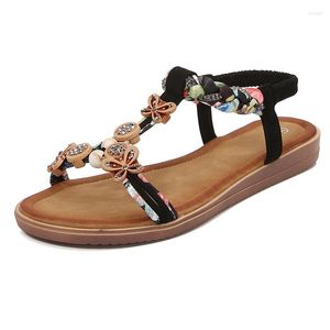 Zomer vrouwen sandalen plat 14566 2024 Boheemse stijl houten gesp gew gew gewonden veter ontwerp open-teen vrouw plus maat 42 9409