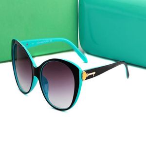 Mujeres de verano Gafas de sol empalme azul negro gafas de ojo de gato marco dorado Corazón clave hebilla de metal diseño chica regalo amante moda eyegl207w