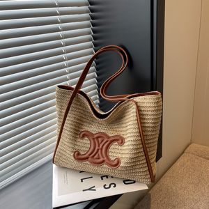 Femmes tissées d'été 2023 Nouveau sac à épaule unique vintage Fashion Fashion tout-en-un sac de paille sous lamblée de grande capacité