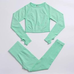 Trajes superiores de yoga de verano Mujeres sexy Transpiración de secado rápido Transpirable Gimnasio Diseñador Ropa deportiva al aire libre