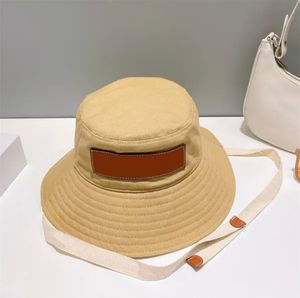 Chapeau de soleil, grand chapeau à bord, 2024 Nouveau chapeau à la mode et polyvalent lettre de ruban en cuir ruban chapeau, chapeau de bassin de protection solaire, bord de corde, chapeau solaire, créateur loe's