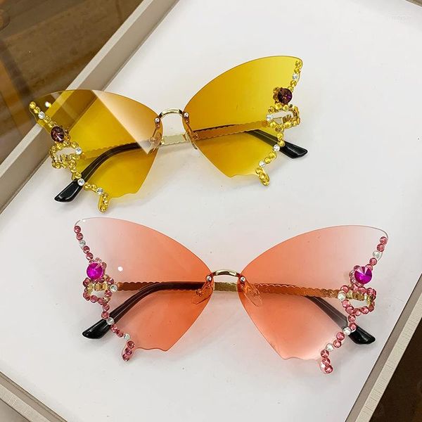 Gafas de sol 2023 Diamante en forma de mariposa sin marco para mujeres en Europa y América Personalidad de la moda exagerada