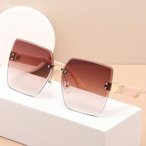 Lunettes De soleil 2023 mode pour femmes UV400 sans monture coupe bord lunettes haute valeur Ins rue tir femme Gafas De Sol