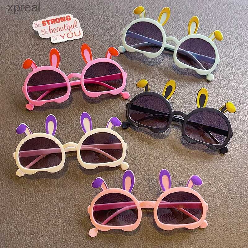 Sunglasses 2024 New Childrens Cute Color Rabbit Ear UV400 Sunglasses for Baby Girls Fashion Outdoor Sun Protection Glasses for Children WX