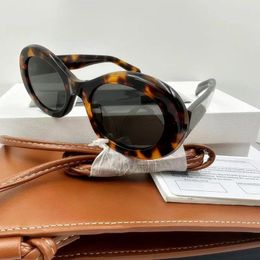 Lunettes de soleil acétate ovale pour les femmes Girl Men de mode Designer de mode Vintage Party Shades Astares Sun Glasse