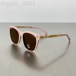 Designer de lunettes de soleil Nouveau style petites lunettes de soleil parfumées 0780 plaque de cadre ronde polyvalente affichage visage jambes de chaîne tissée en peau de mouton KT7P