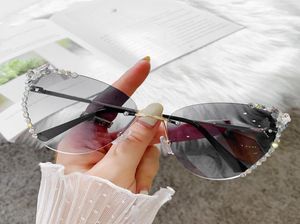 Lunettes de soleil Fashion Cat Eye Femme 2021 Desinger Sun Glasse Bling Diamond Eyeglass Luxury Ringestone Rose Shades UV4002428011