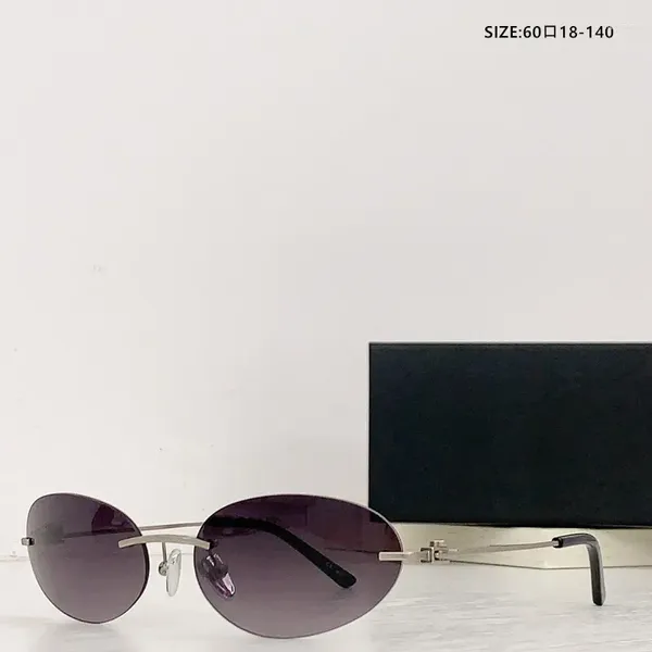 Gafas de sol de moda para mujeres Compras al aire libre Gafas oscuras Conducción sin bordes Retro Oval