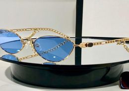 Lunettes de soleil monture en métal œil de chat femmes avec breloques en forme de coeur style de mode dame lunettes 5193822