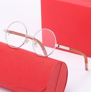 Lunettes de soleil Nouveau cadre rond Mode féminine originale jambe de catapulte en bois tendance pour hommes lunettes en métal polyvalentes Designer Sunglass Top