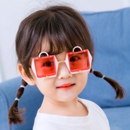 Gafas de sol pequeñas bolsas semimetales niños personalidad de marco irregular vasos toman 2051 atmósfera