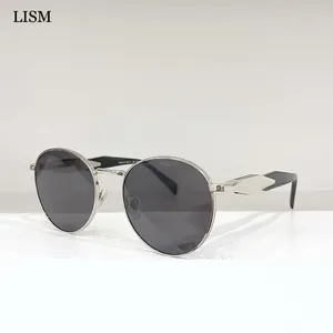 Lunettes de soleil Femmes Elegant Fashion Design Cadre circulaire titane Polarized Outdoor Pilot Vintage Men Glasses