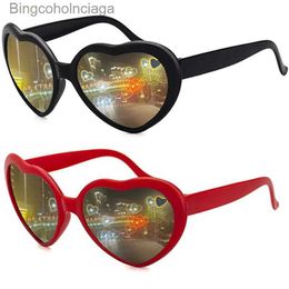 Gafas de sol Mujeres Moda de efectos en forma de corazón Gafas Mira las luces Cambiar a la forma del corazón en las gafas de difracción de la noche Gafas de sol femeninas2312225