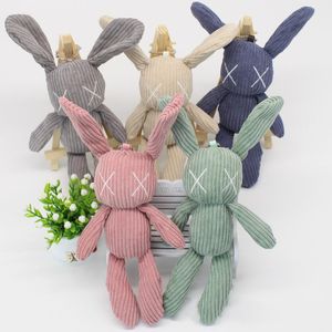 Super mignon lapin rayé peluche porte-clés pendentif lapin poupée mignon saisir machine poupée sac accessoire de mode