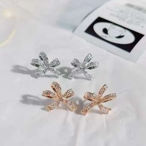 SWAROVSKIS EARRES Designer Women topkwaliteit luxe mode charme diamant vlinderdas met kleine harten zijden vlindervorm kristal oorbellen voor vriendin