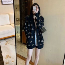 Pull femme 2023 nouvelle veste cardigan tricotée à manches longues et col en V automne et vêtements d'extérieur d'hiver jacquard mi-long lâche et paresseux489