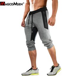 Pantalons de survêtement MAGCOMSEN Pantalon de jogging pour hommes avec poches zippées Taille élastique sous le genou Pantalon de sport pour entraînement de gym Crossfit Training