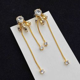 Boucles d'oreilles à pampilles avec nœud doré pour femmes, bijoux brillants, à la mode, pour fête de saint-valentin, magnifiques, luxueux, tendance 2022