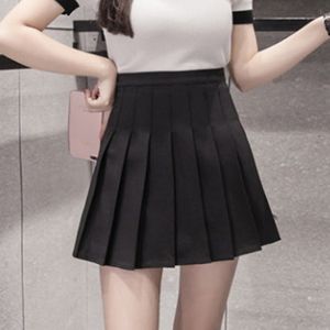 Jupe plissée douce femmes Preppy style mini jupe taille haute filles vintage noir blanc uniformes scolaires mignons jupe streetwear Y1214