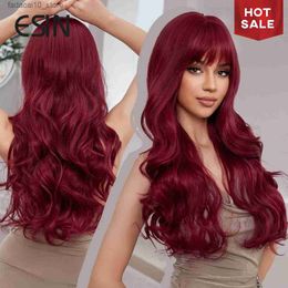 Perruques synthétiques ESIN perruque synthétique longue bouclée ondulée rouge avec frange perruques moelleuses pour femmes haute température cheveux de Cosplay quotidien Q240115
