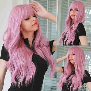 Perruques synthétiques perruque rose longue avec une bangs à vagues naturelles résistantes aux cheveux ondulés perruques synthétiques pour les femmes Lolita Cosplay HKD230818