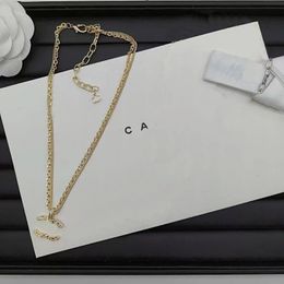 T GG Boutique Collar de diseñador Collar de gargantilla negro de lujo Mujeres Chapado en oro Joyería de alta calidad Nueva perla Collar con colgante de amor
