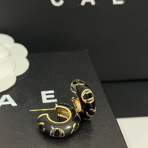 T GG Nuevos aretes negros Diseñador Pendiente de lujo vintage Diseño clásico Regalos Joyería Estilo romántico Pareja Familia Amor Regalo Aretes