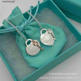 T Home – collier clé d'amour en argent pur S925, à la mode et minimaliste, cravate en forme de cœur de pêche, chaîne de collier de styliste 2024