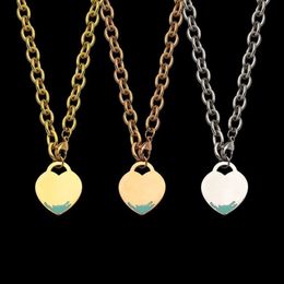 Collar grueso con forma de corazón de melocotón y letra T para mujer, colgante con forma de corazón de melocotón, gota verde de aceite, comercio exterior, 233w