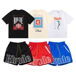 Camiseta para hombre Rhude Shorts Chándales Diseñador Impresión Carta Negro Blanco Gris Color del arco iris Verano Moda Algodón Cordón Top Manga corta