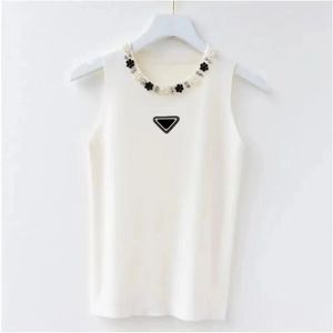 Camiseta Moda de verano Diseñador de mujer Camiseta sin mangas Top Carta de lujo Camiseta de algodón Ropa Manga corta Perla de alta calidad S-XL