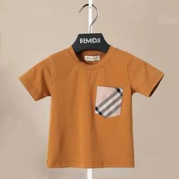 Camisetas Camisetas de verano para niños Camisetas de color sólido para niños Niñas Estilo casual Diseño de rayas de bolsillo simple Manga corta Niños CottonTop 230327