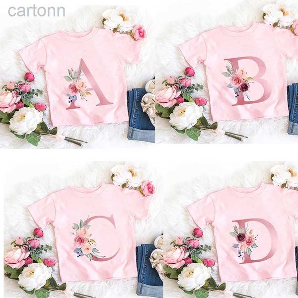 T-shirts Nouveau rose fleur lettre A B C D enfants T-shirt Kawaii T-shirt Anime dessins animés vêtements décontractés enfant fille garçon à manches courtes haut T-shirt ldd240314