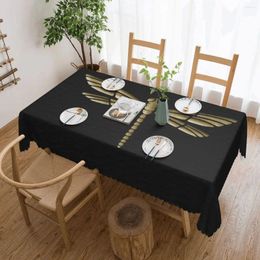Tableau de table en or libellule en relief texture en cuir noir
