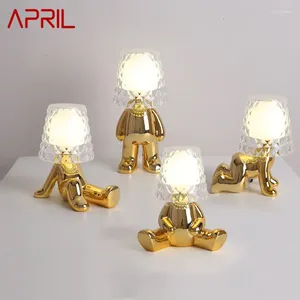 Lampes de table avril nordique lampe créative résine dorée des gens de forme