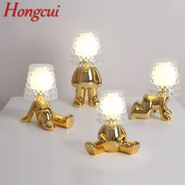 Lampes de table hongcui nordique lampe en résine créative gold de personnes forme de bureau