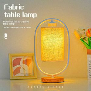 Lampes de table lampe de table scandinave chambre chevet simple personnalité créative nouveau tissu rétro chaud bois massif gradation petite veilleuse AA230421