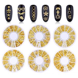Tamax Estilo mixto 3D Remachas de metal de oro Arte de uñas Decoración de corazón redondo Nails Etiqueta de manicura Clavo DIY Accesorios en rueda