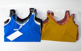 Tank Women Yoga Bras Camisas Chaleco deportivo Tops de fitness Ropa interior sexy Color sólido Lady Top con copas extraíbles Yogas Sports Bra Tank5239085