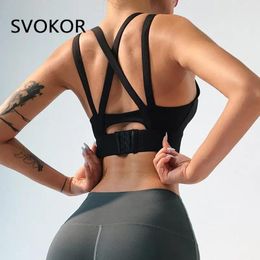 Réservoirs SVOKOR haut soutien hauts de sport femmes Fitness Gym culture hauts Push Up entraînement sous-vêtements rembourrés licou élastique réservoir croix dos Bras