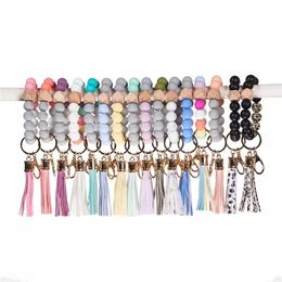 Tassel Ups Pead de cuentas de madera Pulseras de llaves de llaves de silicona Girl Key Ring Correa para la cadena de automóviles Múnita Regalo portátil 417 S Let ED