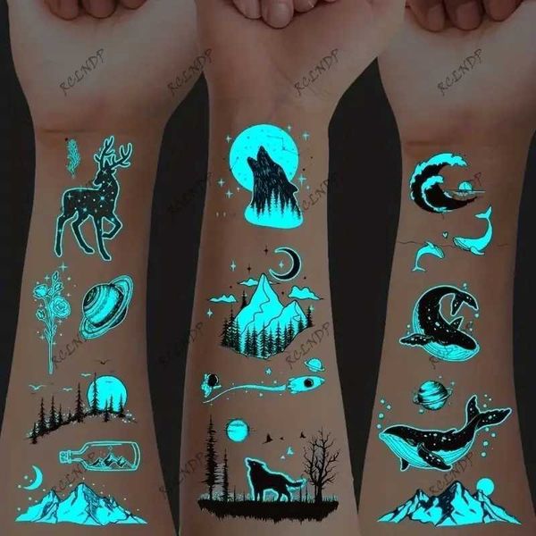 Transfert de tatouage 12pcs étanche à tatouage temporaire montagnes wolves baleines star noctilucent faux tatou flash tatoo tato pour femmes hommes 240426