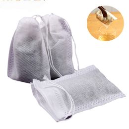Thee -zeefsel 100pcslot wegwerpzakken lege tas met snaar genezen afdichtfilterpapier voor kruidenzakken los 230406