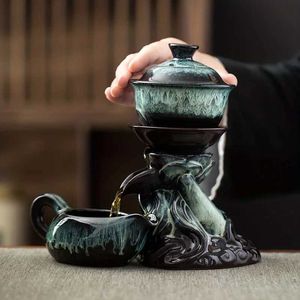 Ensembles de voiles de thé 1 ensemble en céramique Kung Fu Tea Set Lazy Tea Fabriquer avec distributeur en eau rotatif Tureen avec plateau et tasse de thé cadeau créatif