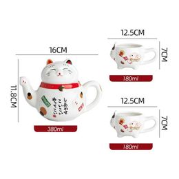 Ensembles de voies de thé 1 set Maneki Neko Lucky Cat CeraMic Teaware 1 théière et 2 tasses à thé Boîte-cadeau en porcelaine de thé en porcelaine avec passoire