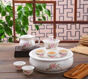 Ensembles de thé 8pcs / Set Bone China Kung Fu Théière et tasse en céramique Cérémonie Japonais Gong Mariage chinois