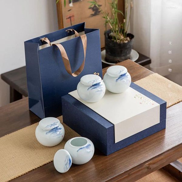 Juegos de té de porcelana azul y blanca, tetera de cerámica, paisaje pintado a mano, cuatro cajas de regalo de alta gama, logotipo personalizado medio malicioso
