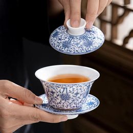 Conjuntos de té Porcelana azul y blanca Tres cubiertas Tazón Taza de té Infusor de té de cerámica individual con neumático fino